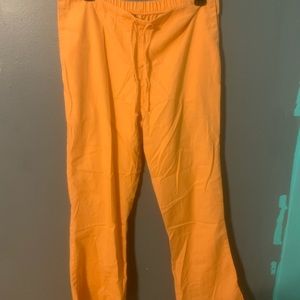 Cherokee Scrub pants. Size Small. Peachy Orange color.